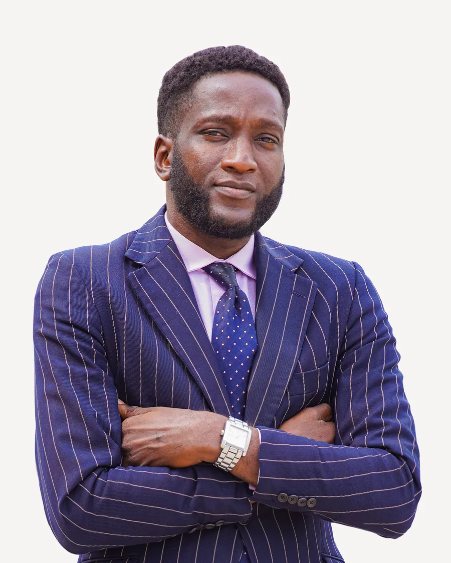 Mike Bruce, Brand Growth Architect and Consultant, arms crossed, in a navy pinstripe suit