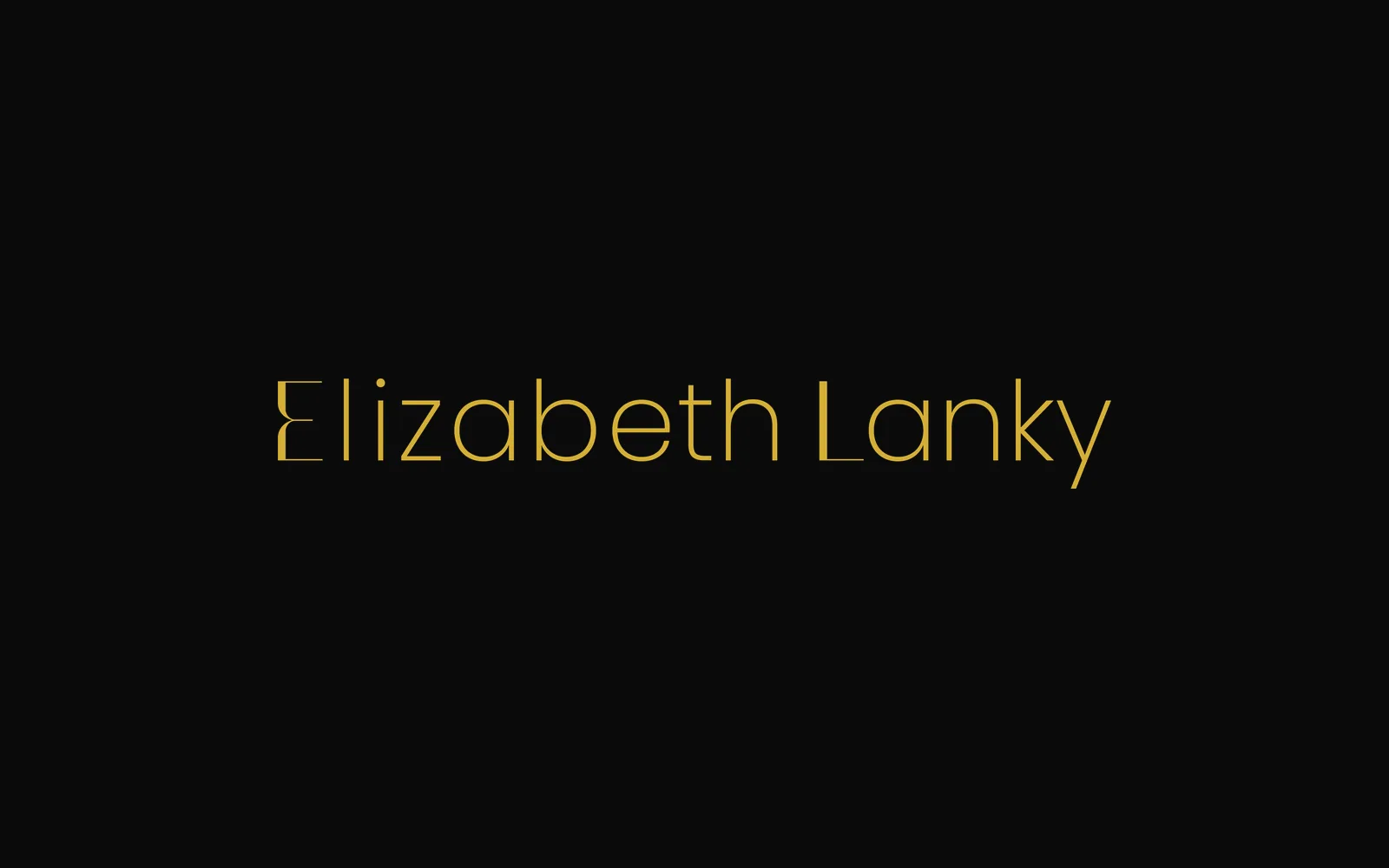 Elizabeth & Lanky wordmark in gold on Midnight Black